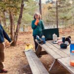 Hikers at a picnic table